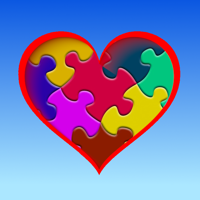 Kolorowe puzzle ujęte w kształt serca